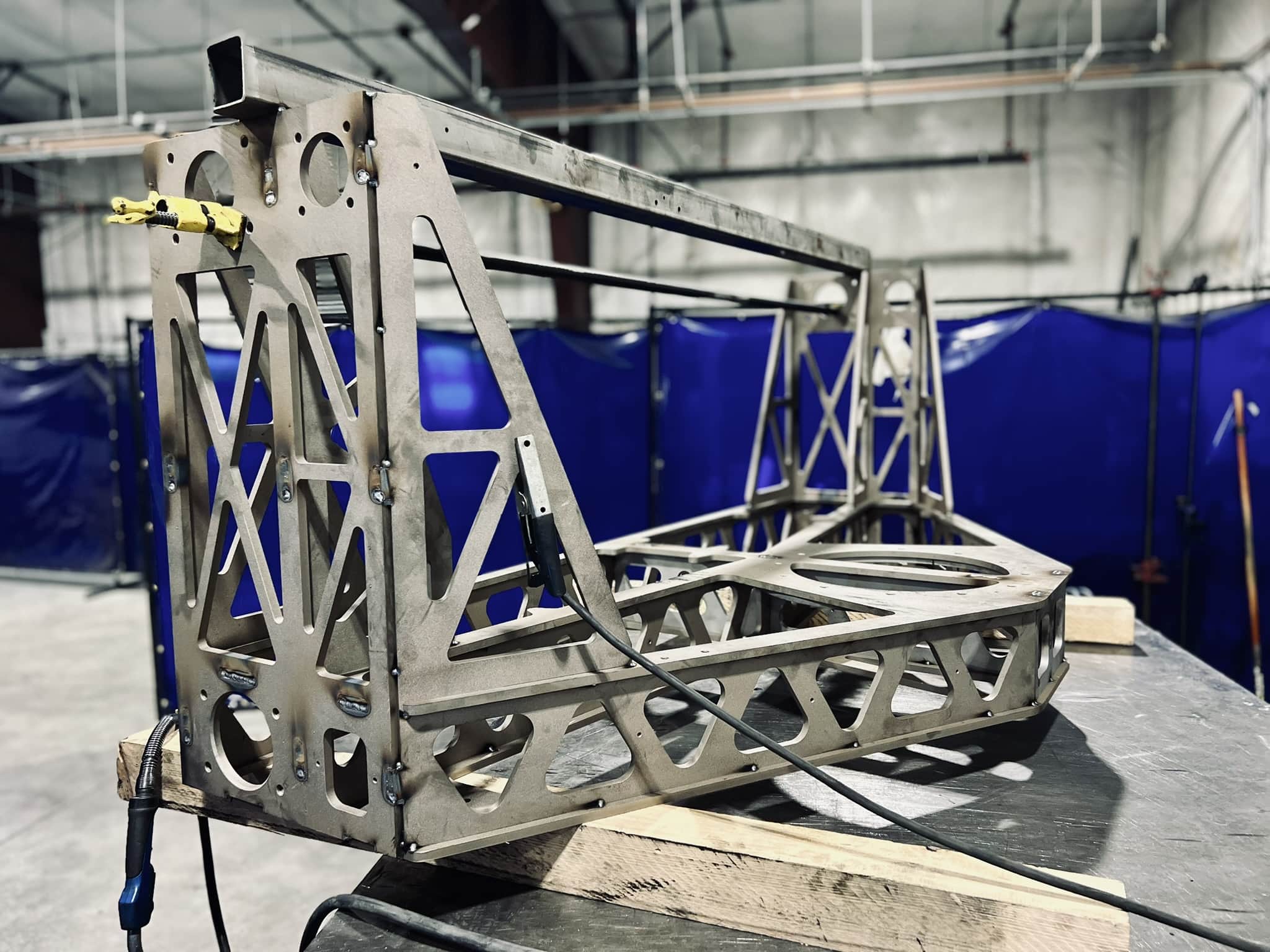 Finished weldments prepared for coating